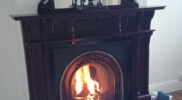 Arched-fireguard-dark-fireplace